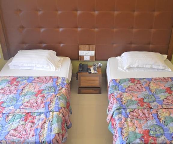 Hotel Executive Gujarat Surat twin bed