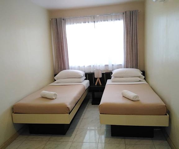 The Royale House Travel Inn and Dormitel Davao Region Tagum Room