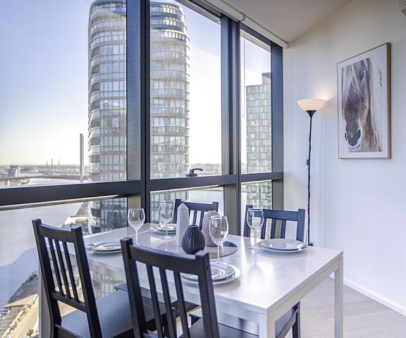 Docklands high level 1 Bedroom Apartment with pool by KozyGuru Victoria Docklands In-Room Dining