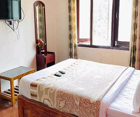 FabHotel Sri Guhan EIite Tamil Nadu Kodaikanal bedroom