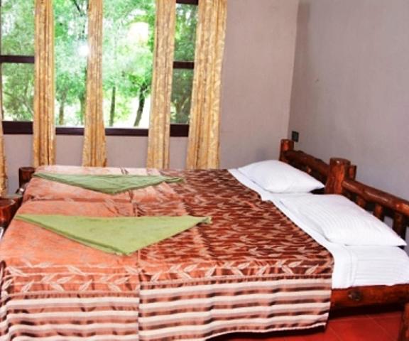 Dubare Elephant Camp-Jungle Lodges Karnataka Coorg bed