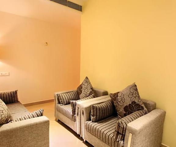 HOTEL WYTE PORTICO Kerala Adoor suite room sofa area